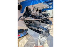 Helm station of 2000 Advantage Poker Run 40 with dual Garmin displays, center console steering, and forward visibility tow...