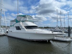 Bow view of 2002 Silverton 392 Motor Yacht showing forward seating and cabin profile in Rock Hall, Maryland.