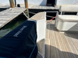 Chris-Craft Roamer 40 cabin cruiser galley with stainless steel appliances and wood cabinetry.