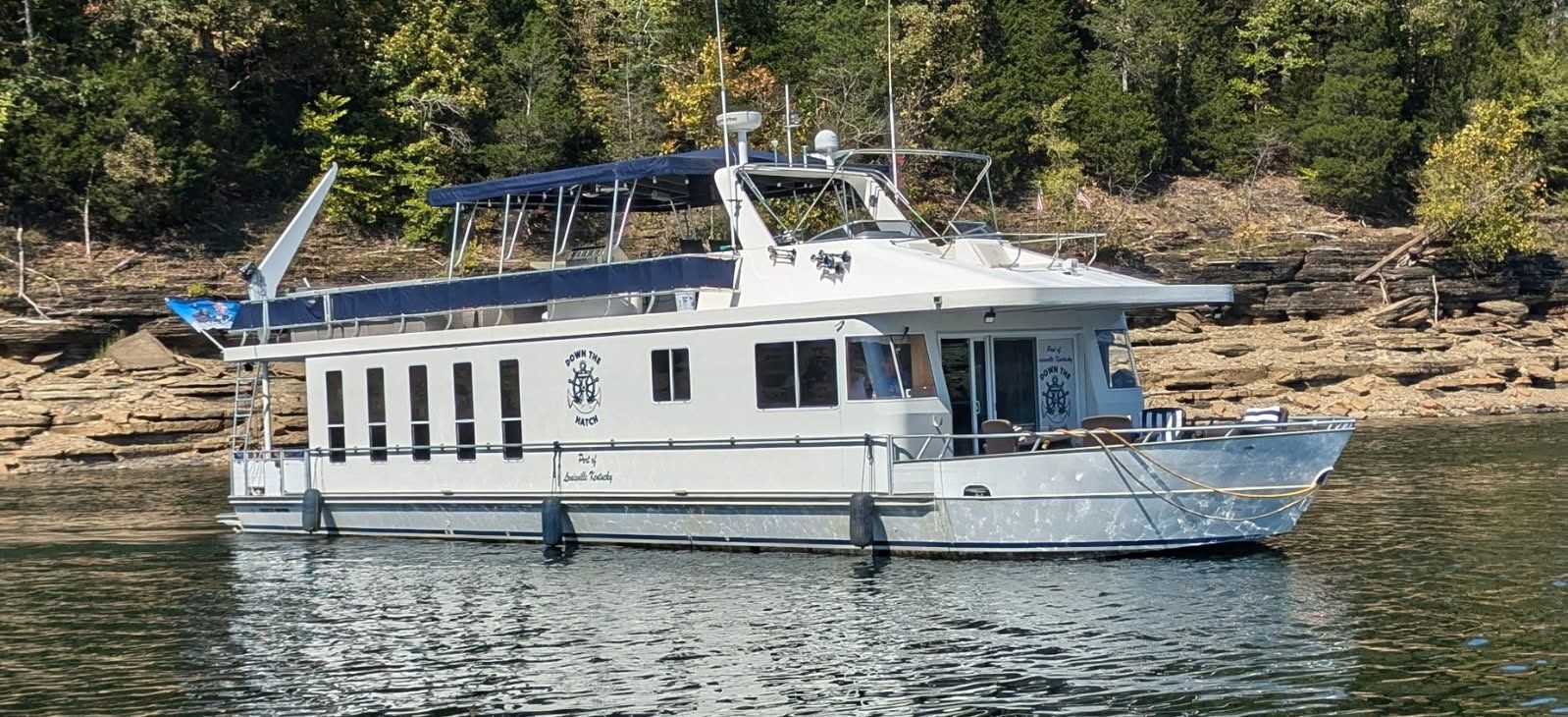 2007 Monticello 70 River Yacht three-quarter starboard profile view on calm inland waterway in Jamestown, Kentucky