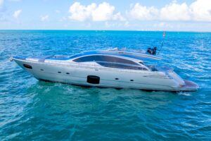 2013 Pershing 82 aerial or elevated exterior view showing sleek Italian sportyacht hull design, aggressive bow profile, an...