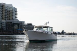 Bow view of 2014 Back Cove 37 cruiser showing forward seating and cabin entry in Stamford, Connecticut.