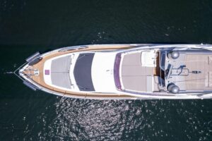 2015 Ferretti 750 flybridge deck with seating, helm station, and open sky views aboard the 75-foot motor yacht in Miami