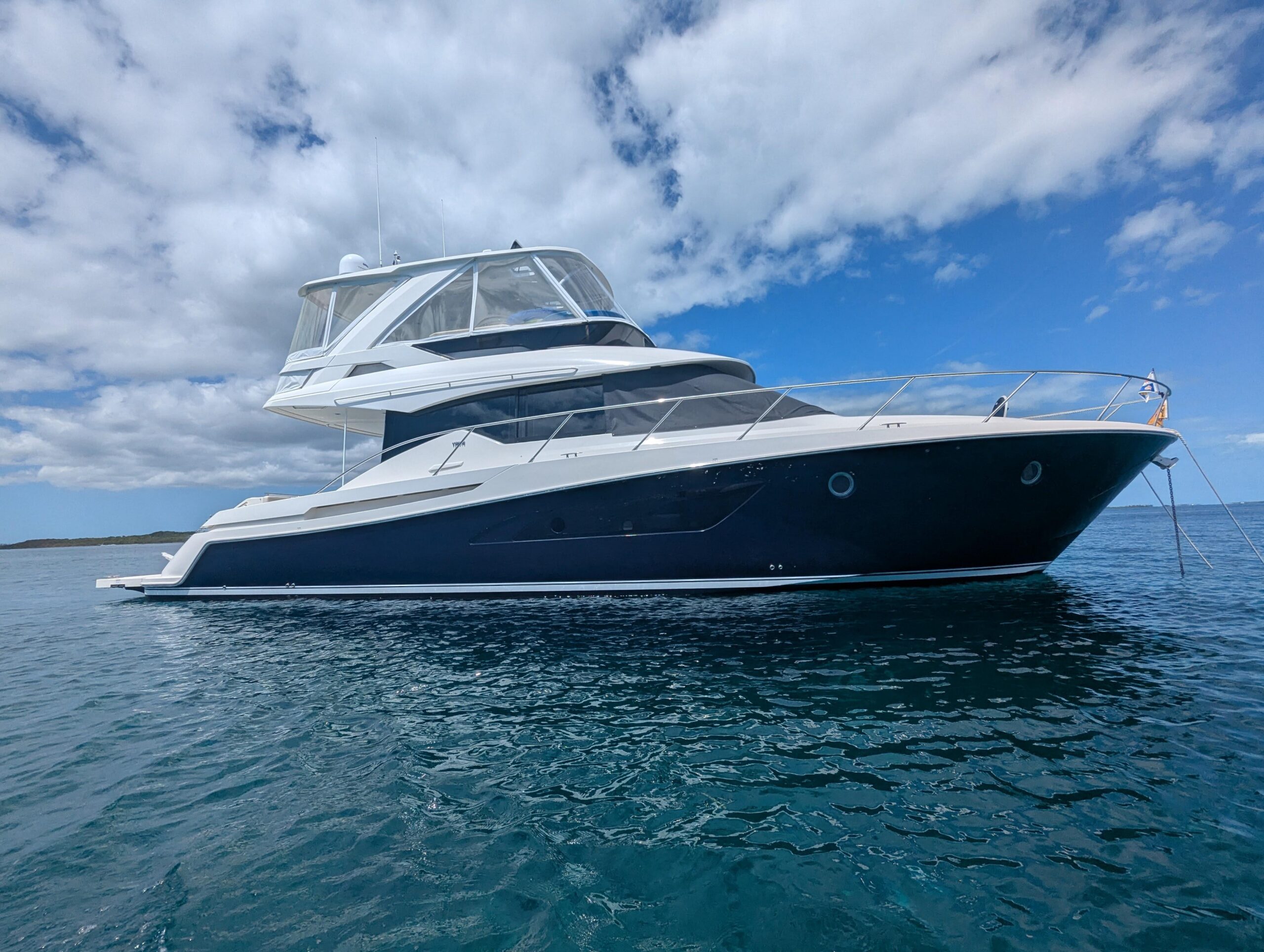 2020 Tiara Yachts F53 Flybridge 53-foot yacht exterior profile showcasing twin hardtops and full beam design in Longboat K...