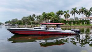 Bow view of 2022 Nor-Tech 50 Sport center console with forward seating and windshield in Miami Beach.