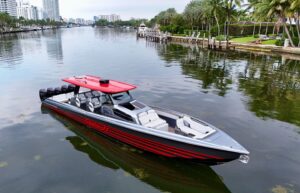 Bow view of 2022 Nor-Tech 50 Sport center console with forward seating and windshield, Miami Beach.