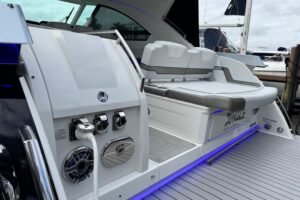 2023 Formula 400 Super Sport Crossover helm station with dual Garmin displays, leather helm seat, and center console steer...