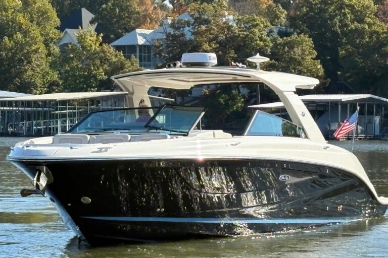 Bow view of 2023 Sea Ray SLX 400 with integrated seating and windscreen detail.