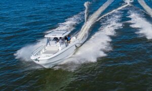 Beneteau Flyer 9 SPACEdeck helm station with dual helm seats, steering wheel, and forward windscreen visibility.