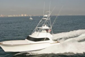 2026 Buddy Davis 58 Sportfisherman bow view showing forward seating and cabin profile at 61.75 feet