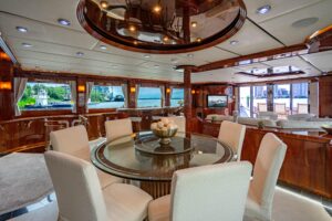 94-foot Destiny flybridge motor yacht with enclosed upper deck and dual helm stations visible from elevated vantage point.