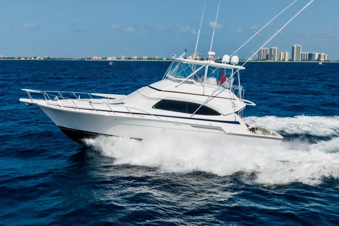 2001 Bertram 510 Convertible cruising profile showing classic convertible sportfisher hull design with flying bridge tower...