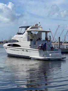 2001 Carver 444 Cockpit Motor Yacht 46.5-foot exterior profile showing white hull with dual stacks and flying bridge in Ro...