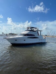 2001 Carver 444 Cockpit Motor Yacht bow section with forward seating and cabin entry in Rockport, Texas.