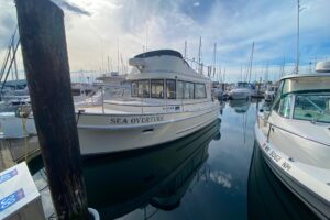 Bow seating and forward cabin entry on 2002 Camano 30 cruiser.