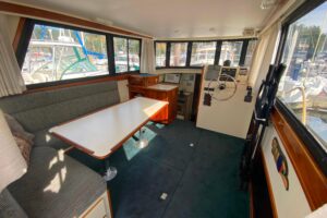 2002 Camano 30 cabin cruiser helm station with wheel steering and instrument panel