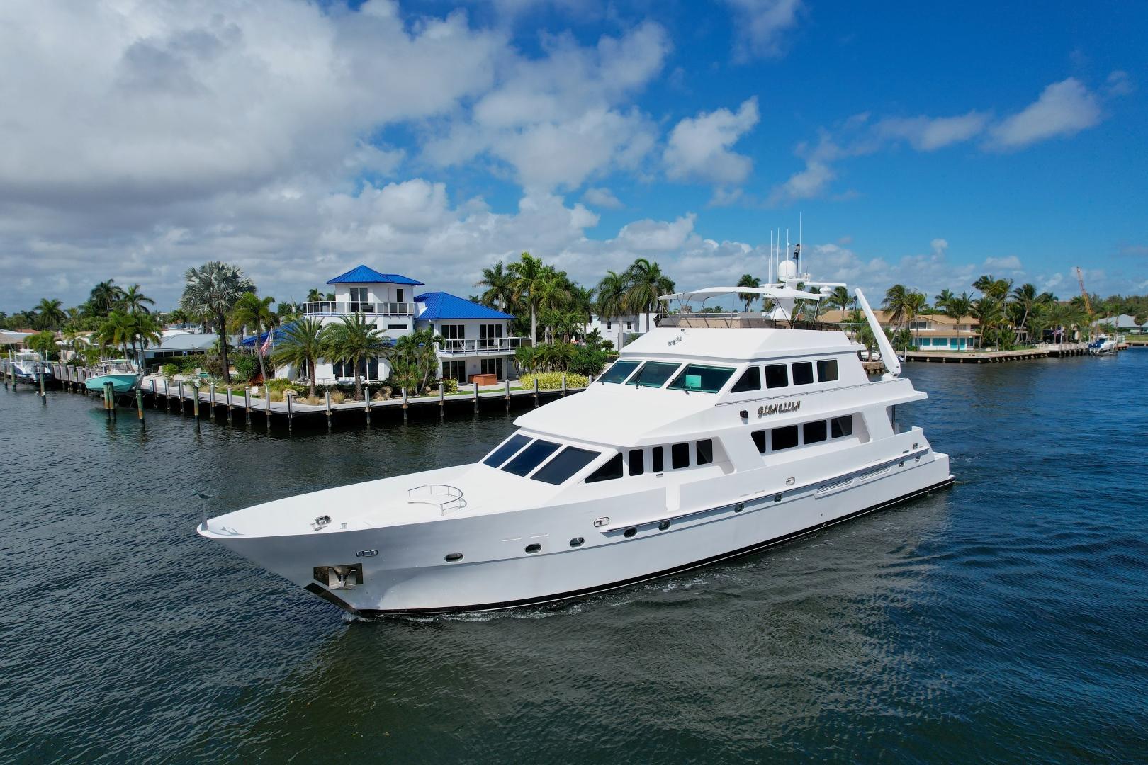 2002 President 100 Motor Yacht exterior profile starboard side view showing full length classic motor yacht design in Fort...