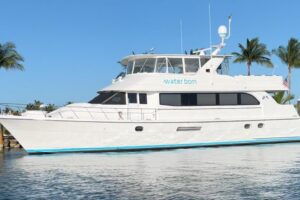 2003 Hatteras 75 Cockpit Motor Yacht exterior profile starboard side view showing full length hull and superstructure in H...