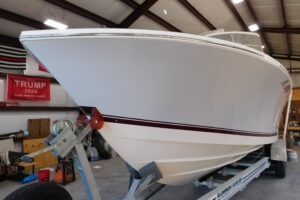 Bow seating and anchor storage on 2003 Regulator 32 center console fishing boat.
