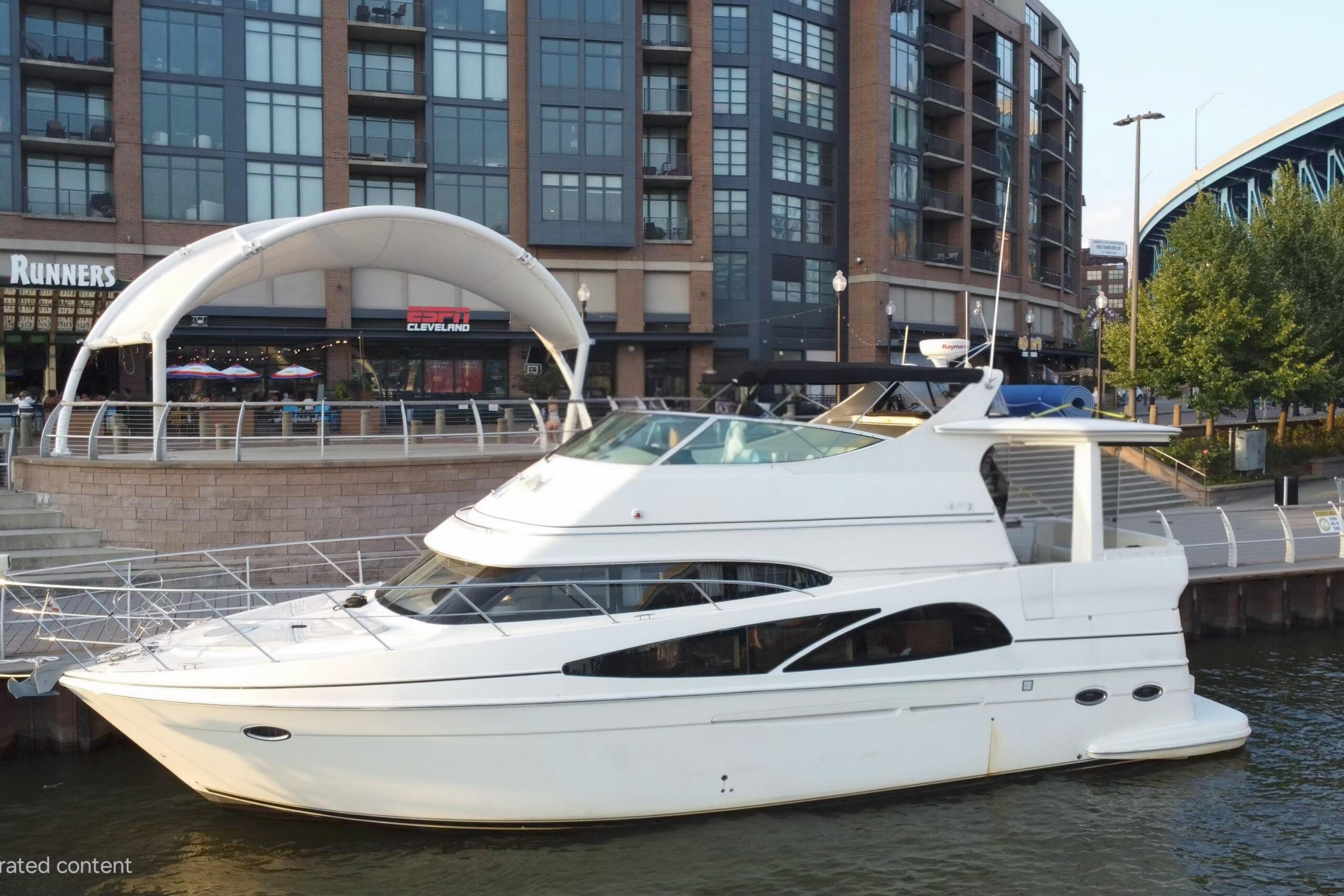 2005 Carver 466 Motor Yacht exterior profile starboard side showing full-length trawler design with twin smokestacks and h...