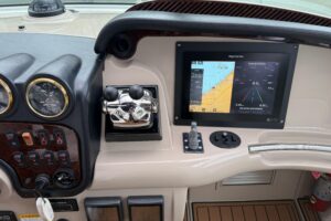 Carver 466 Motor Yacht salon with upholstered seating, entertainment center, and cabin access.