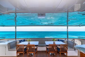 157-foot Christensen motor yacht with classic teak and white exterior profile in San Diego.