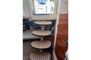 Galley with stainless steel appliances and cabinetry aboard 2005 Sea Ray 340 Sundancer.