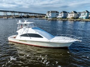Ocean 57 motor yacht bow section with forward seating and cabin entry in Manteo, North Carolina.