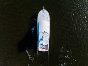 I'd be happy to help generate SEO-optimized alt text for this yacht photo, but I don't see the actual image attached to yo...