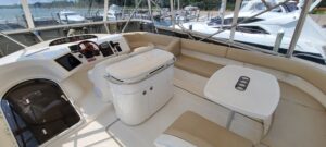 2006 Viking Princess 61 Flybridge bow section with forward seating and pulpit railing on Lake Michigan.