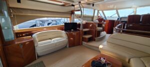 2006 Viking Princess 61 Flybridge with elevated flybridge helm station and hardtop overlooking bow and forward deck.