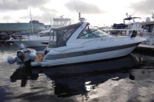 Bow view of 2007 Cruisers 340 Express with forward seating and windshield.