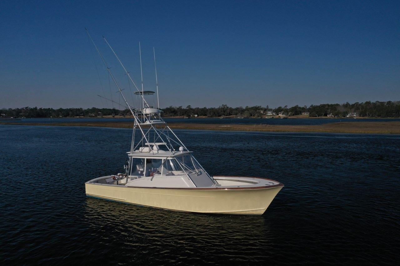 2007 Gamefisherman 42 Walkaround with sonar equipment moored in Kailua-Kona showing starboard profile and hardtop.
