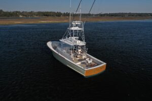 2007 Gamefisherman 42 Walkaround with sonar equipped helm station and center console design, bow view showing forward seat...