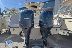 2007 Grady-White Bimini 306 bow seating area with forward console and windshield.
