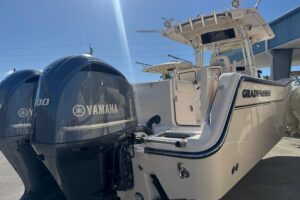 2007 Grady-White Bimini 306 bow seating and forward cabin entry with hardtop shade.