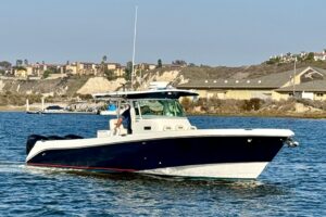 Bow view of 2008 Everglades 350 center console with forward seating and stainless steel railings.