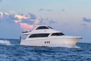 72-foot Hatteras Enclosed Bridge motor yacht profile showing full exterior starboard side with enclosed pilothouse and dua...