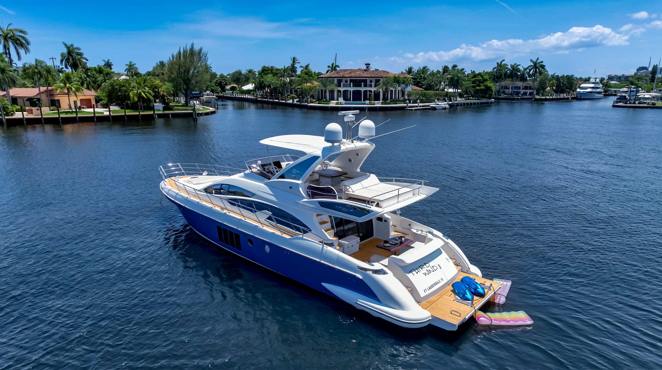 2013 Azimut 64 motor yacht exterior profile starboard side view in Fort Lauderdale showing full length flybridge and hardt...