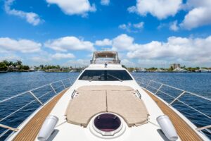 Galley with stainless steel appliances and cream cabinetry in 2013 Azimut 64 motor yacht.