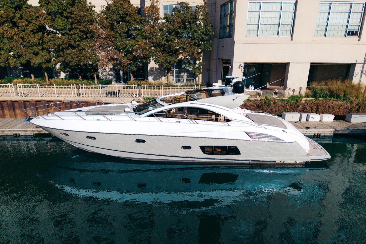 2014 Sunseeker Predator 60 luxury motor yacht profile showing sleek hull design and running profile in Chicago.