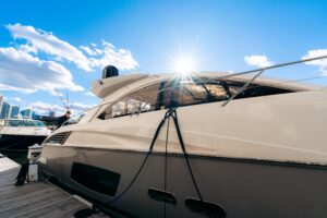 Sunseeker Predator 60 helm station with dual Garmin displays and leather-wrapped steering wheel in Chicago.