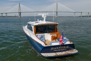 Bow view of 2015 Hinckley Talaria 43 with teak foredeck and stainless steel railings in Charleston, SC.