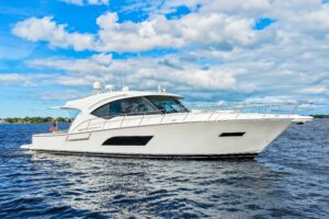 Bow seating and anchor windlass on 2015 Riviera 565 SUV sport utility yacht in Stuart, Florida.