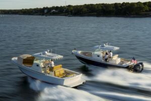 2016 Hunt Yachts 32 center console bow view with forward seating and windshield.