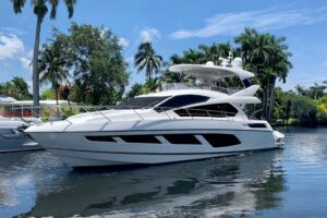 2016 Sunseeker Manhattan 65 motor yacht exterior profile showing full starboard side with flybridge and hardtop in Boston.