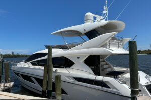 Sunseeker Manhattan 65 bow section with forward seating and curved windscreen on 69-foot luxury yacht in Boston.