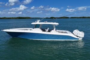 Bow view of 2017 HCB 42 Siesta showing forward seating and cabin entry with hardtop coverage.