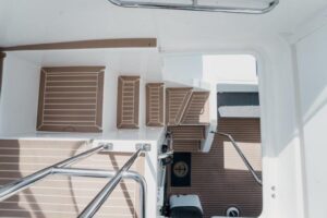 Galley with stainless steel appliances and white cabinetry aboard 2017 Leopard 51 Powercat.