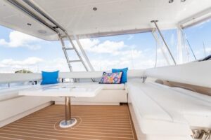 Galley with stainless steel appliances and light wood cabinetry in 2017 Leopard 51 Powercat.